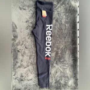 Reebok Cobalt Blue Leggings with White Vertical Logo and Red Patch